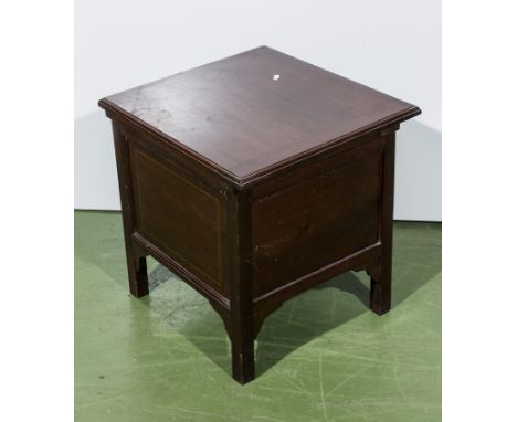 A commode box, lift up lid.