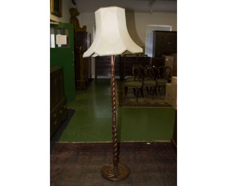 A standard lamp and shade