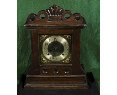A brass face mantle clock