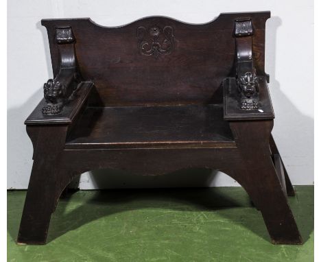 Late Victorian Arts and Crafts style hall bench with carved lion arm rests