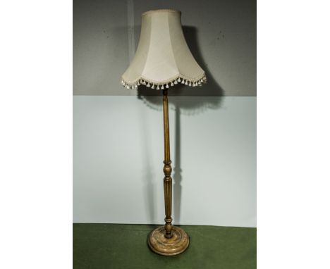 A standard lamp and shade