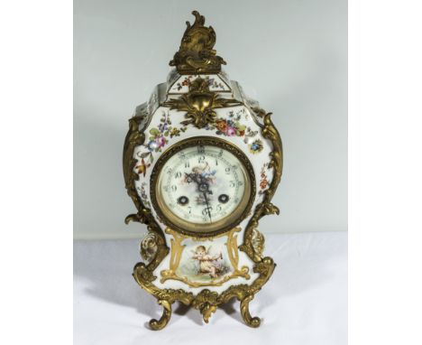 A French porcelain and ormolu mounted mantle clock