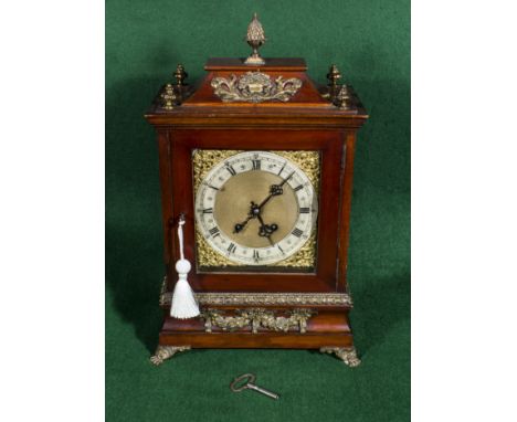 A walnut shelf clock with ormolu