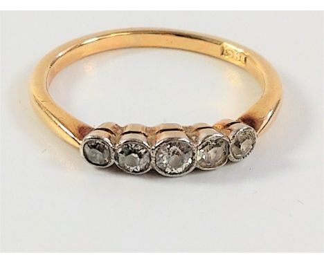 A Five Stone Diamond Ring. Set in 18 carat gold. Size M. 2.34 grams. 