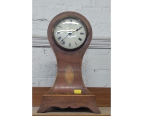 A Eureka Clock co. Balloon shaped mantle clock with electric movement. 37cm high. In good clean condition..
