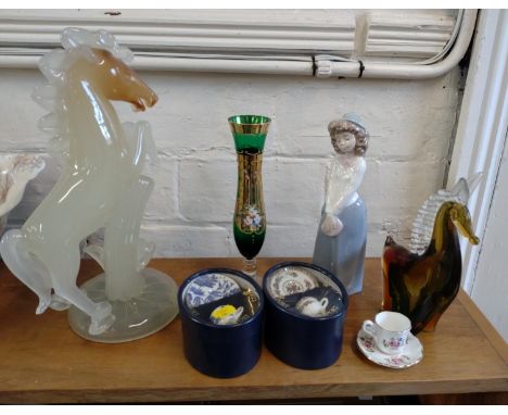 Nao figure of a girl 23cm, two Coalport and one Grosvenor miniature cups with saucers, a green glass vase and two glass horse