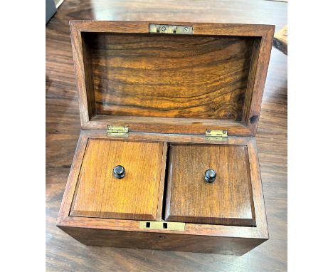 A Victorian Domed walnut two compartment tea caddy. Circa 1850. 