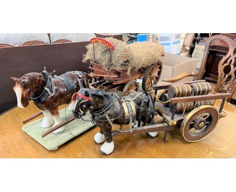 Two Ceramic  Shire dray horses and carts. 20th century. The largest, 30cm x 80cm. 
