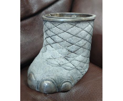 An elephant foot container with silver plated liner and toes. Vintage 
