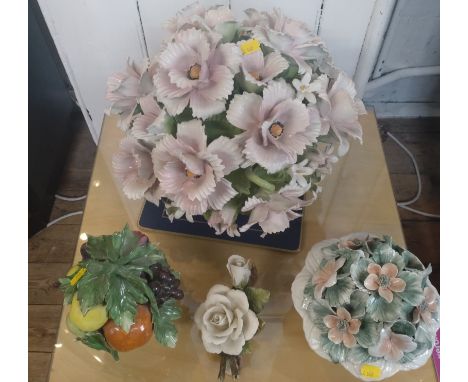 A Capodimonte ceramic flower group 38cm wide by 34cm high, two flower groups and bowl of fruit. 