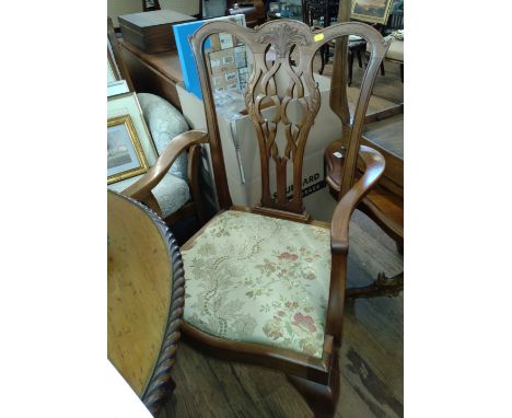 Six Chippendale Style Mahogany Dining Chairs, with ornate spal backs. (two are carvers) 