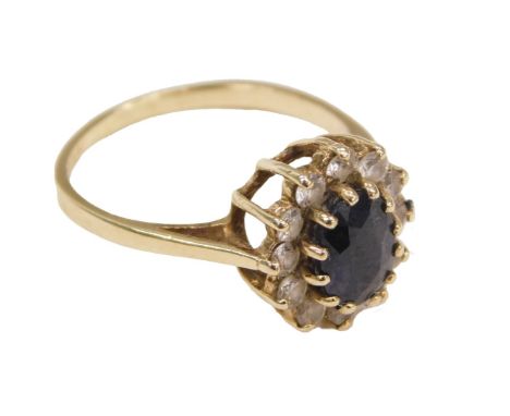 A 9ct gold sapphire and CZ ring, in an oval basket setting, size K, 1.9g.