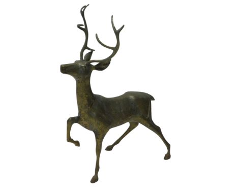 A large brass Oriental style model of a stag, 86cm high. 