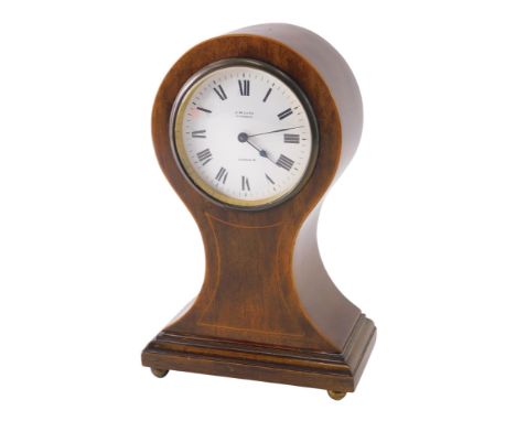 An Edwardian mahogany and boxwood strung balloon shaped mantel clock, the enamel dial stamped J Moor Oxford Street London, on