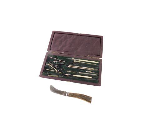 A small pocket or hunting knife, stamped Herbet Robinson Sheffield, with antler handle, and a part set of drawing instruments