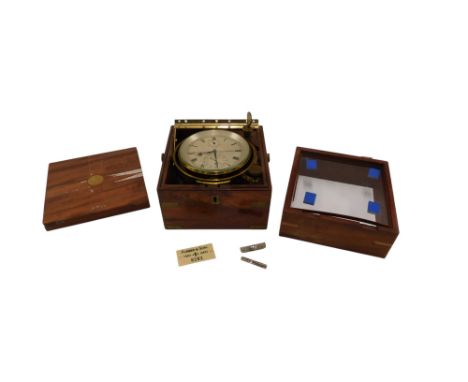 A marine chronometer signed by Furber and Sons Cheltenham, numbered 8282 to the silvered dial, with two day fusee movement, t