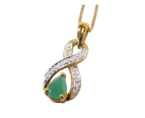 A 9ct gold emerald and diamond pendant, in a double loop design, on a fine curb link neck chain, with bolt ring clasp, 1.6g.