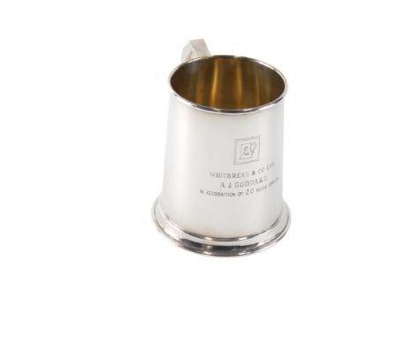 An Elizabeth II silver mug, of plain form, engraved Whitbread and Co Limited AJ Goddard In Recognition of 20 Years Service, S