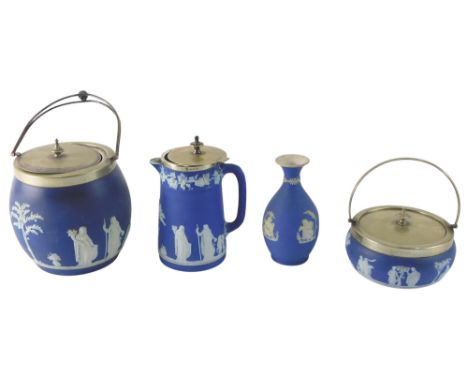 A Wedgwood blue Jasperware biscuit barrel, with silver plated mounts, a similar preserve jar, hot water jug, and a vase. (4)