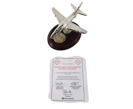 A limited edition silver plated model of a Red Arrows plane, issued by The Westminster Mint, with certificate, number 0141/19