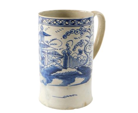 A late 18th/early 19thC pearlware cylindrical mug, decorated in blue with Oriental style scenes, 16.5cm high. (AF)