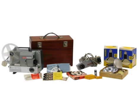 A projector in mahogany case, and various accessories. 