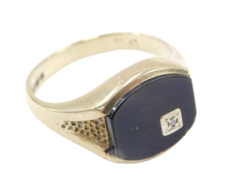 A 9ct gold black onyx and diamond set gentleman's signet ring, size R½, 4.7g.