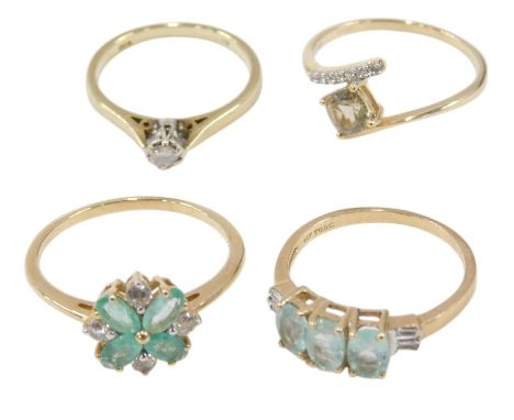A 9ct gold and diamond solitaire ring, high claw set, size N½, 9ct gold and gem set flower head ring size S½, and two further