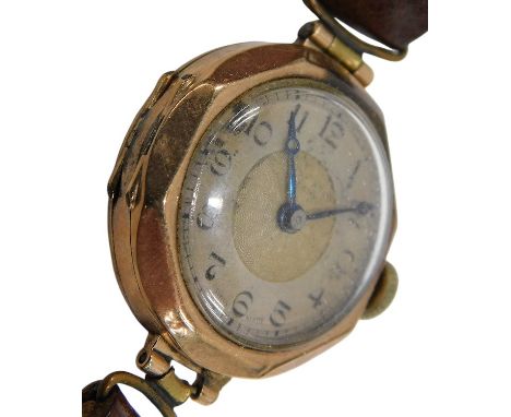 A mid century 9ct gold cased lady's wristwatch, circular silvered dial, with chapter ring bearing Arabic numerals, the case o