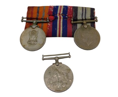 A trio of medals, consisting of the British 1939-45 medal, the Indian 1939-45 medal, and the Raksha medal, awarded to militar