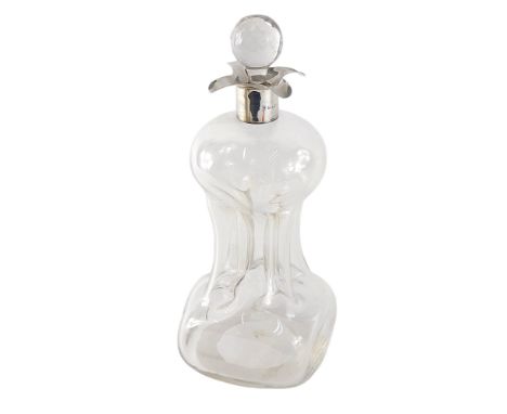 An Edwardian silver decanter, of waisted hourglass form, with silver collar, Birmingham 1903, and glass stopper, 30cm high. 