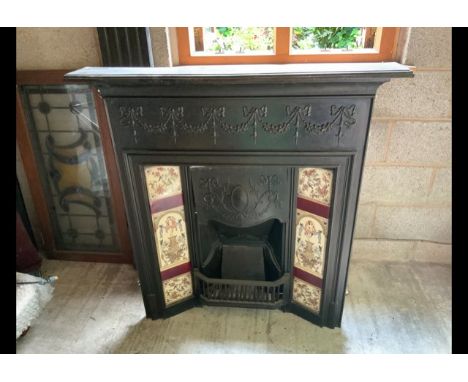 A Victorian cast iron fireplace with tile surround, approximately 177 cm x 104 cm x 16 cm.

Item is located in the WN5 postco
