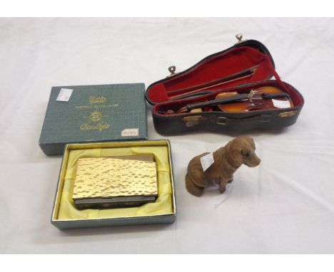 A cased miniature violin - sold with a boxed vintage lighter and a carved wooden dog figure