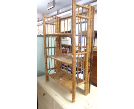 A 52cm late Victorian bamboo three shelf folding bookcase