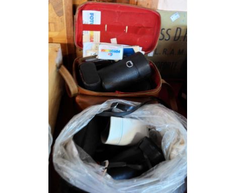 A cased Praktica camera and assorted lenses - sold with an Olympus Pen and assorted lenses