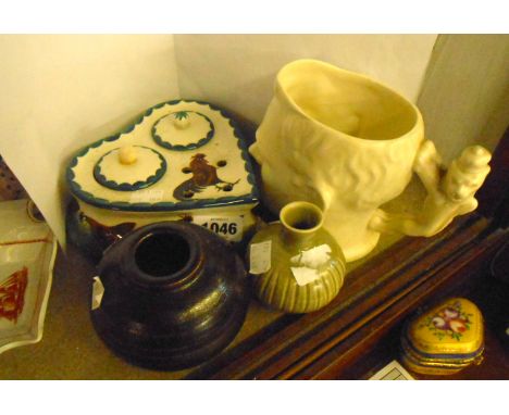 A David Leach stoneware vase of squat form decorated with brown glaze and a Lowerdown Pottery small celadon bottle vase with 