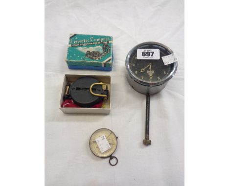 A vintage Smiths car dashboard clock - sold with a boxed lensatic compass and another pocket compass