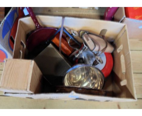 A box containing assorted collectable items including silver plated entree dish, fire bell, vintage Kodak camera, etc.