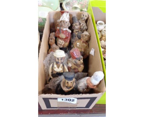 Ten Tremar pottery figures including band leader, chimney sweep, carpenter, etc. - one over painted
