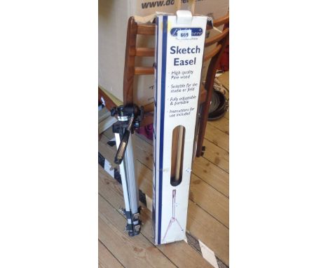 A boxed Goldmere wooden sketch easel - sold with a Boots camera tripod