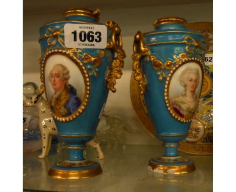 A pair of French porcelain vases decorated in the Sevres style, both with central dual framed portrait roundels - a/f