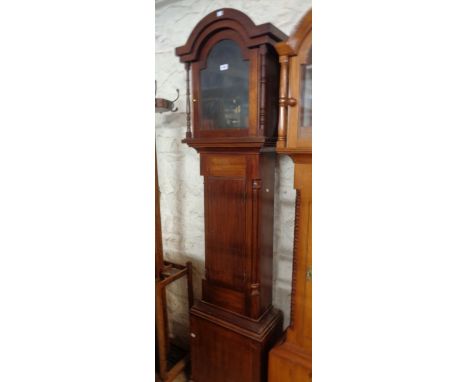 A stained mahogany longcase clock case with spindles to hood and quarter columns to trunk