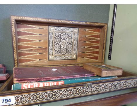 A vintage wooden inlaid folding backgammon board - sold with Scrabble and draughts