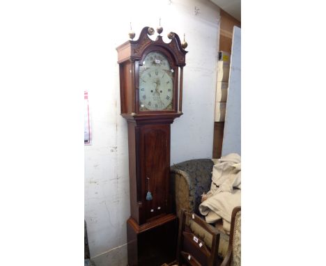 A 19th Century mahogany longcase clock with carved decoration to swan neck pediment, the 33cm painted arched dial marked for 