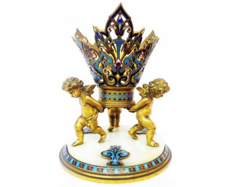 A 19th Century French gilt brass and champleve enamel table centrepiece with three cherubs holding a central basket with Art 