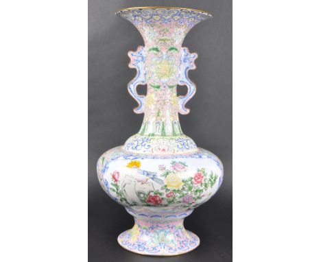 A large early 20th Century Chinese Canton enamel vase. Hand painted decoration depicting birds and flowers with repeating scr