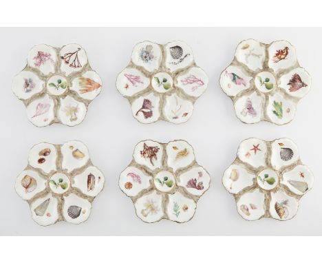 Haviland &amp; Co., Limoges, France. Set of six porcelain oyster plates decorated with sea life in each bowl. Marked along th