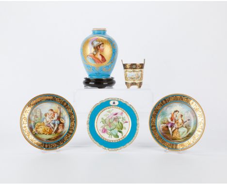 Group of five French old Paris Sevres style porcelain objects including one urn, one cup, and three plates. The pair of plate