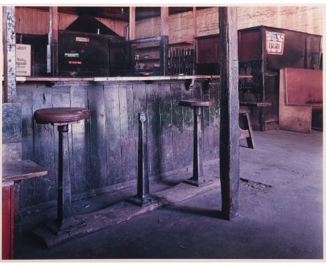 Birney Imes (American, b. 1951). Photograph depicting a rustic empty bar. Chromogenic print.Provenance: Distinguished corpora