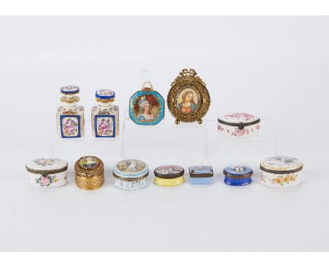 Group of 12 French hand painted porcelain containers and plaques including two jars, two plaques, and 8 pill or trinket boxes